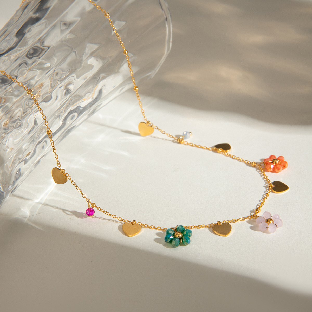 European and American cross-border INS style 18k gold stainless steel colored glass bead flower-shaped with heart pendant.